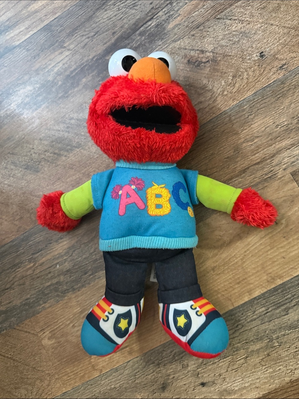 Sesame Street Elmo Plush in Red with Blue ABC Shirt and Green Sleeves talking el